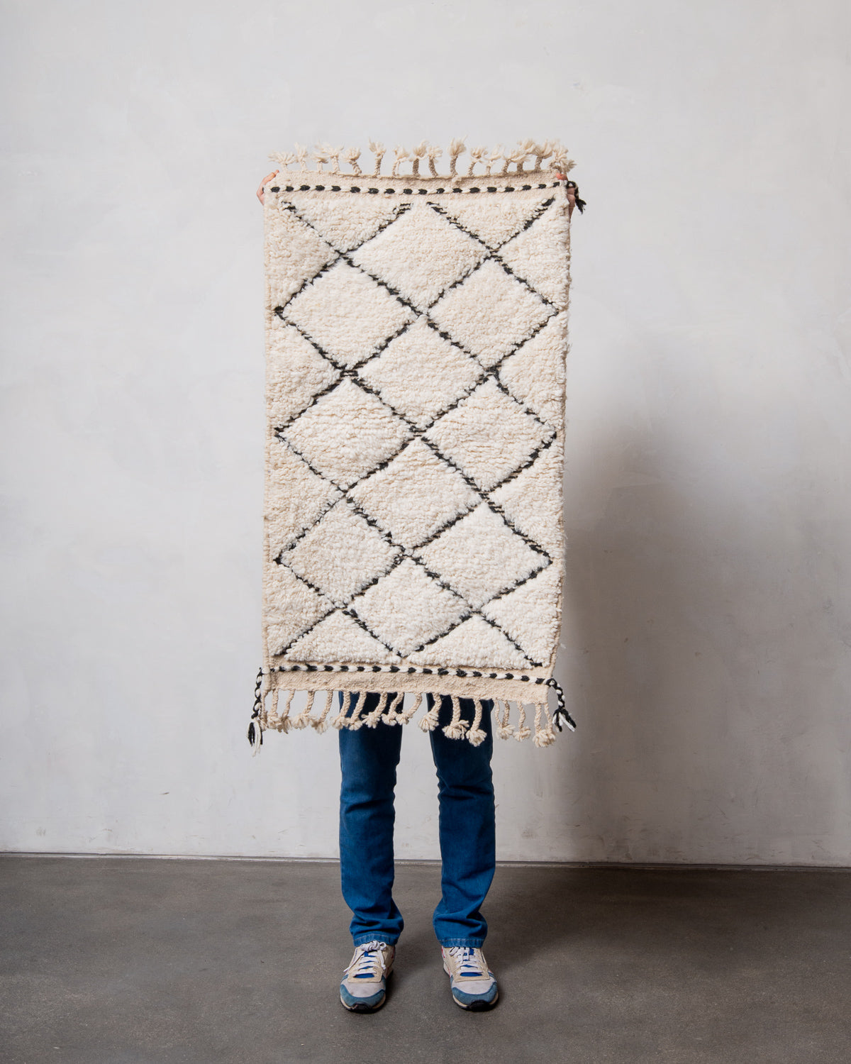 Modern, designer, handcrafted Berber rug from Morocco. Beniourain carpet with beautiful colours and patterns and fluffy wool texture.